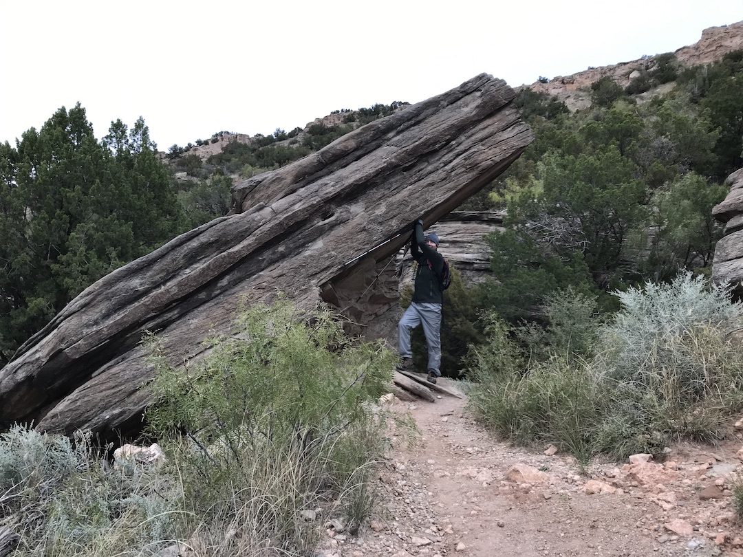 Check holding up stone.jpg